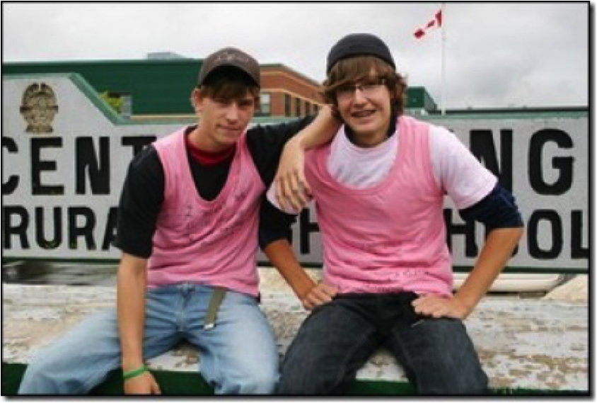 photo of David Shepherd and Travis Price in Pink tank tops
